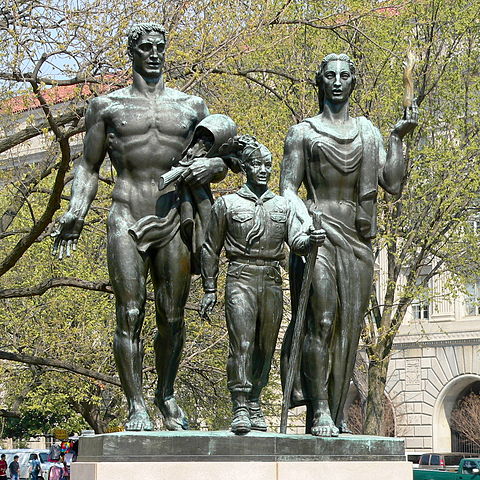 Group of statues of father, mother and boy scout